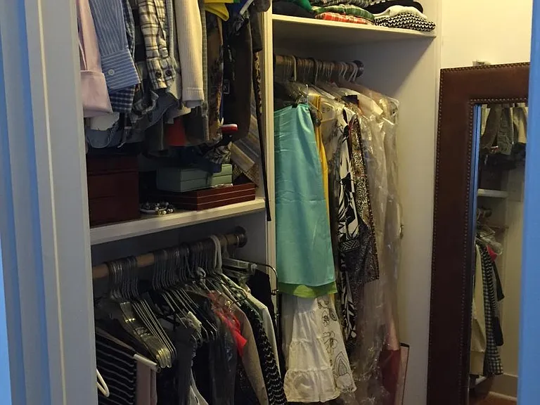 Custom-made, walk-in closet with floor-to-ceiling adjustable
