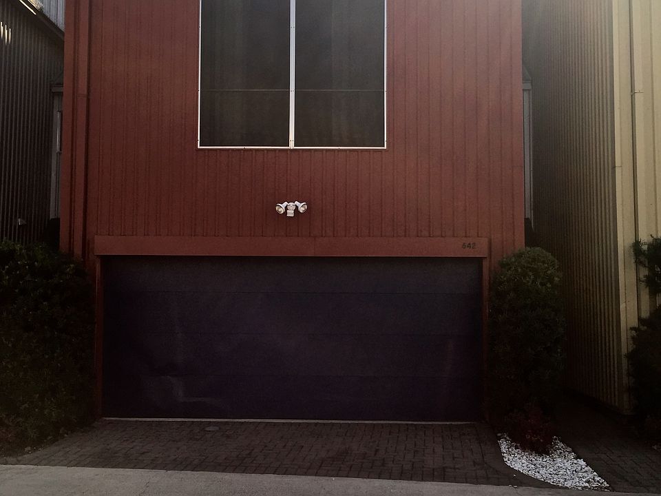 Front of house, two car garage