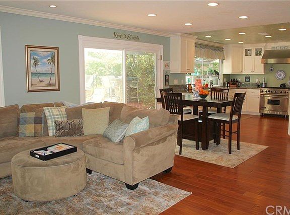 Beautiful interior with wood floors, replaced windows, gourmet kitchen and more!