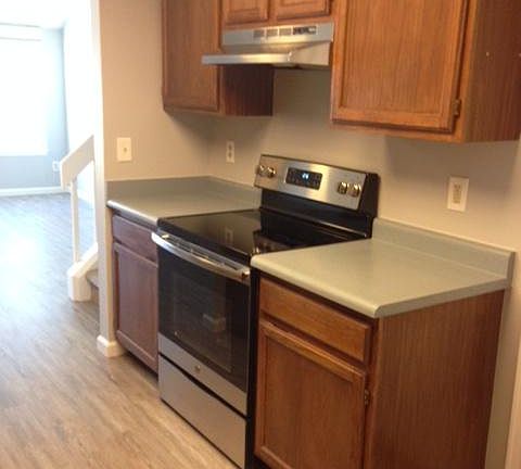 Brand new stove and wood flooring.