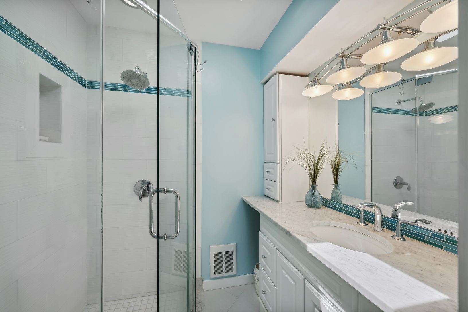 One of three full bathrooms
