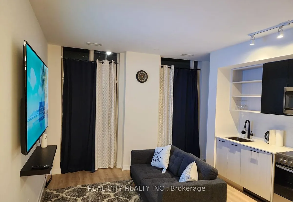 Building Photo - 2300 Saint Clair Ave W #107