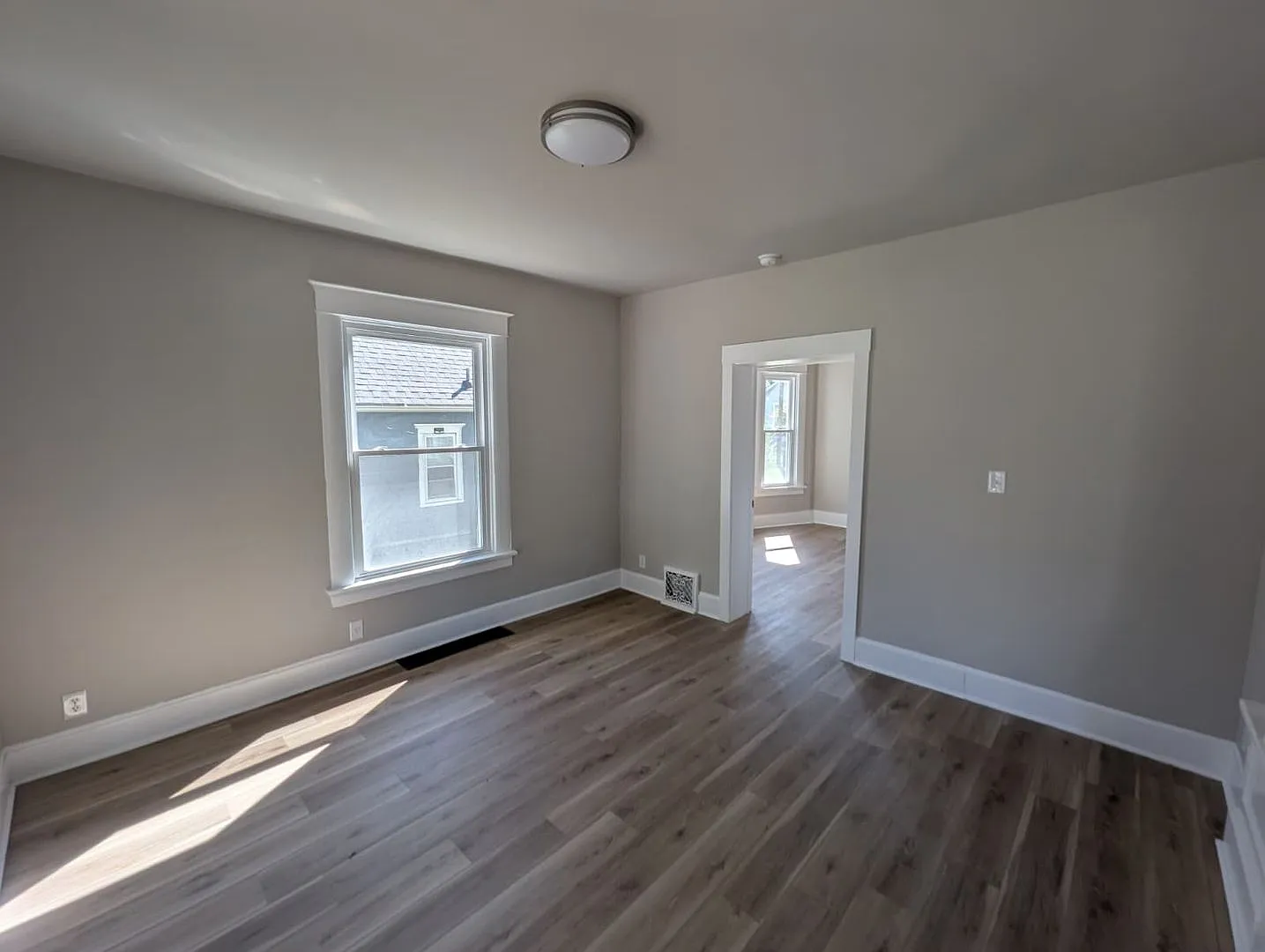 Remodeled Home with Main-Floor Master Bedroom, Full Basement & Storage Shed — Photo 4