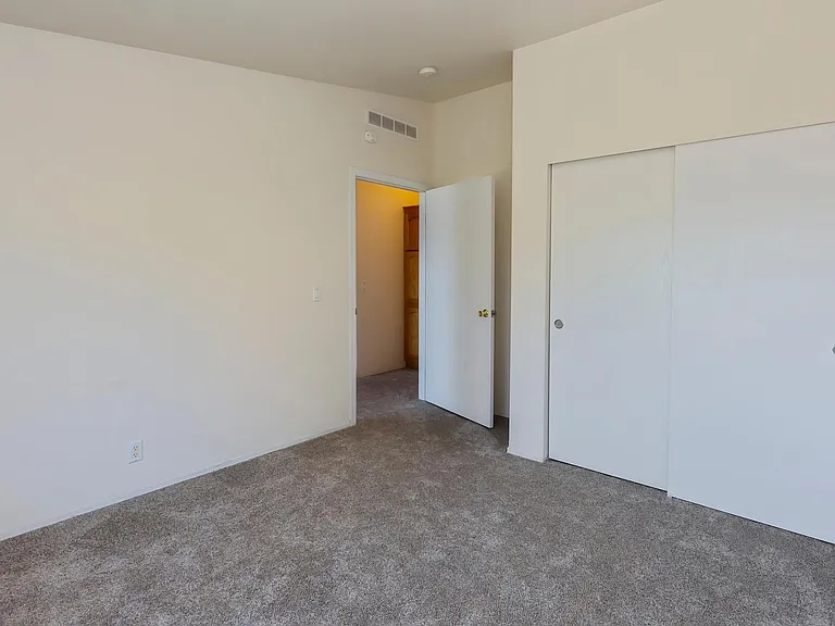Closet and entry to 2nd bedroom.