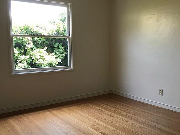Bedroom is both private and has great greenery out the window