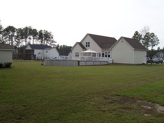 Rear view of house and pool
