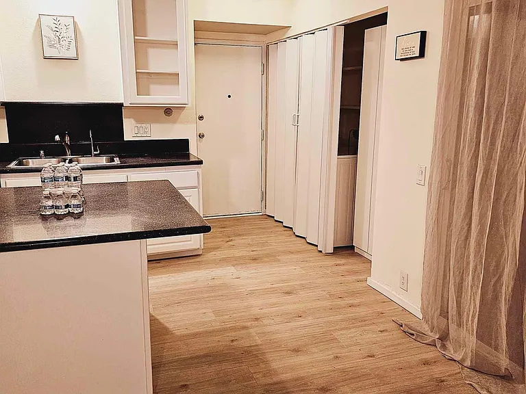 Garage door. In-unit washer-dryer and coat closet