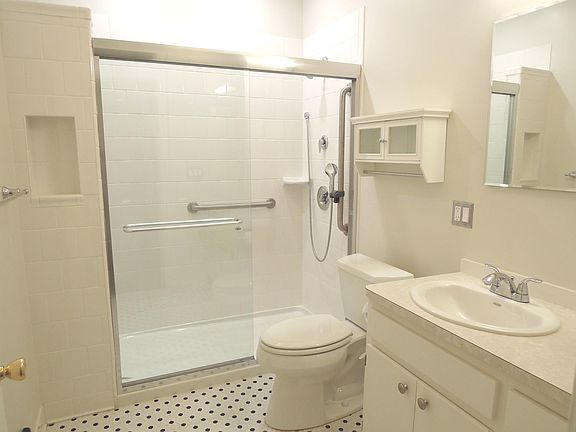 Renovated bath w/walk-in shower:8'-11" x 5'-11"