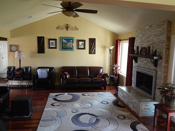 Large vaulted Ceiling in Living room
						:
						Large room over looking the 26 acres lake with new special efficient windows