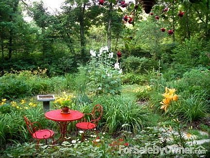 Perennial Gardens from Porch
						:
						Enjoy 3-season Perennial and Herb Garden. Enjoy the local butterflies & birds.