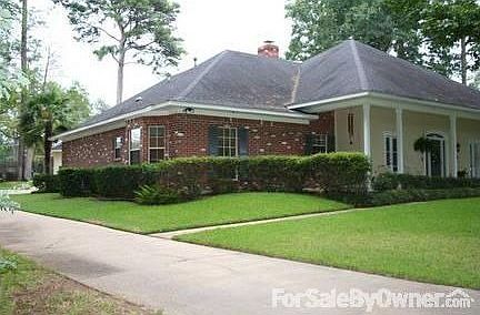Side view of 2003 Chase Crossing : Beautiful brick on sides of home Additional parking and garage in