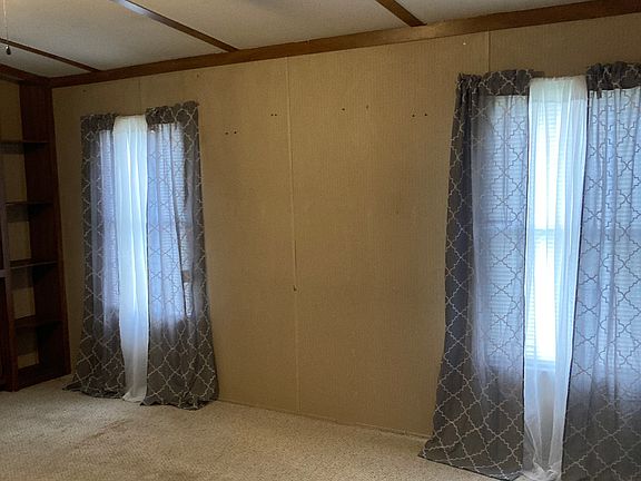 Opposite side of living room.