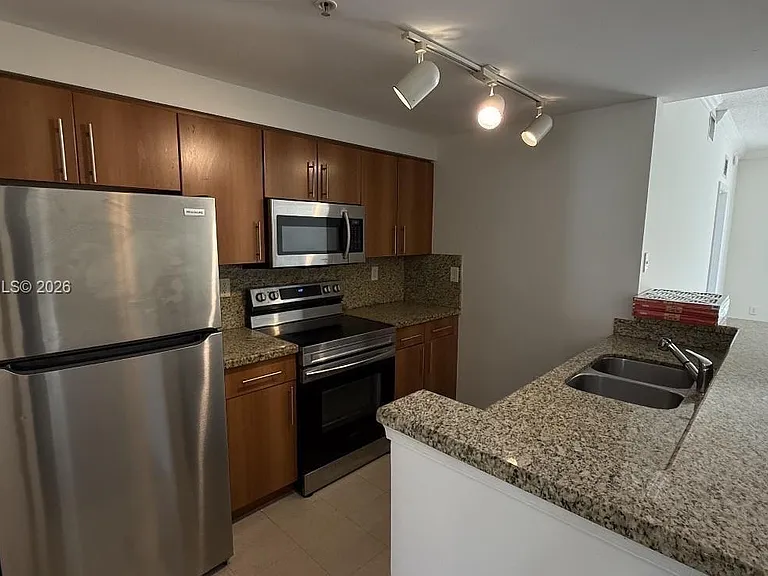 5800 W Sample Rd #307 — Photo 2