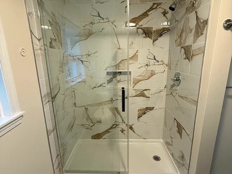 Beautiful newly tiled shower