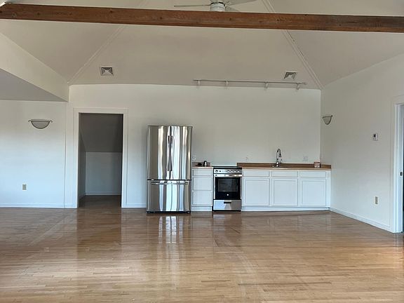Living area looking back into kitchen