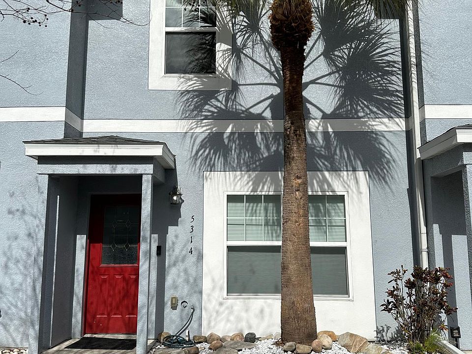 Front of home with parking space