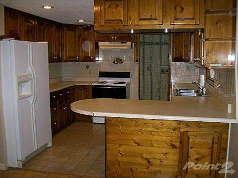 Large  Kitchen with Abundant Cabinets And Counter Space