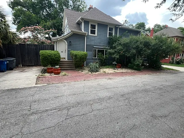 Front of Duplex, private, separate entrance and dedicated driveway on left