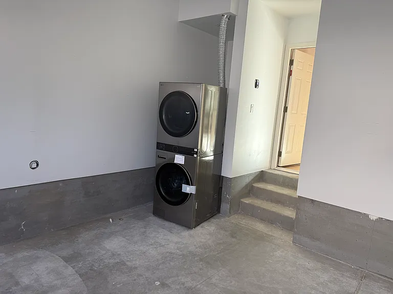 Stacked washer/dryer in garage