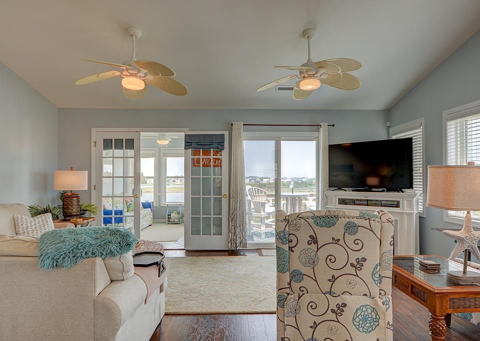 Soothing colors, comfortable furniture and that water view invites you in to Ohana.