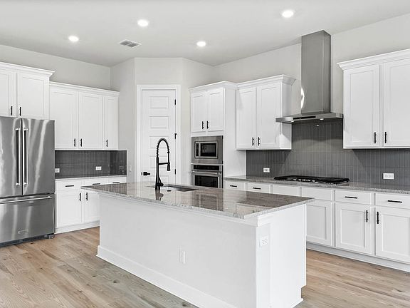 The kitchen has a convenient kitchen island.