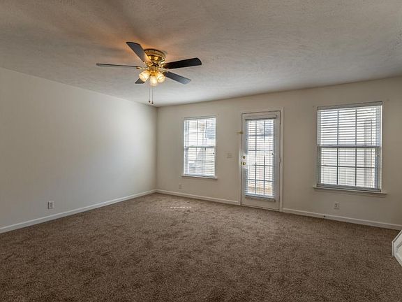 Living Room with Exit to Back Patio