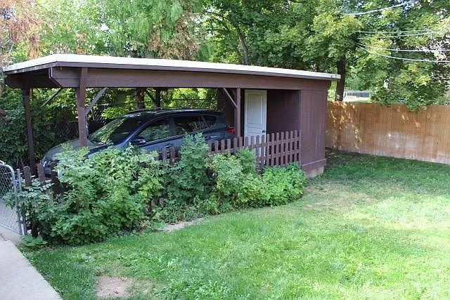 Car Port with Locked Storage to fit bikes kayaks skis etc