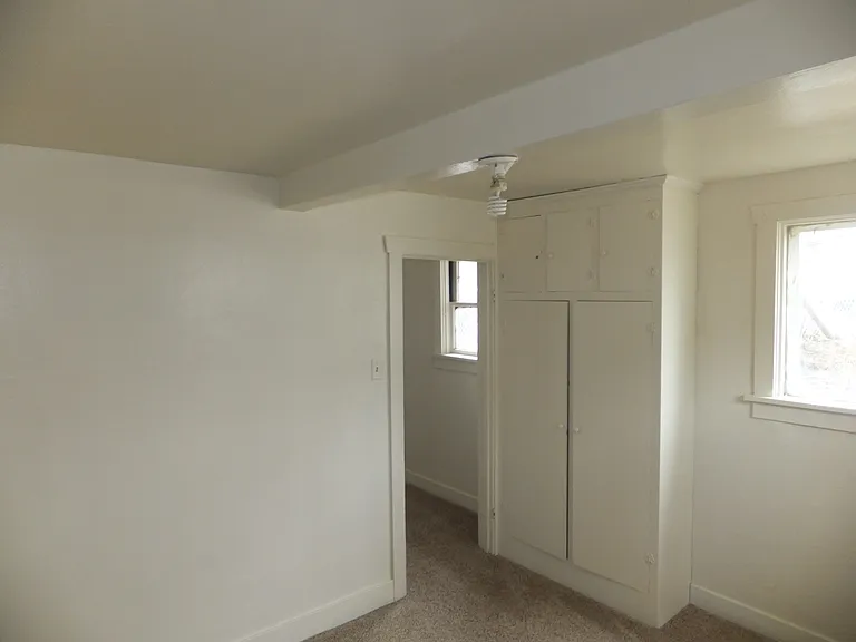 Bedroom with builtin cabinet
