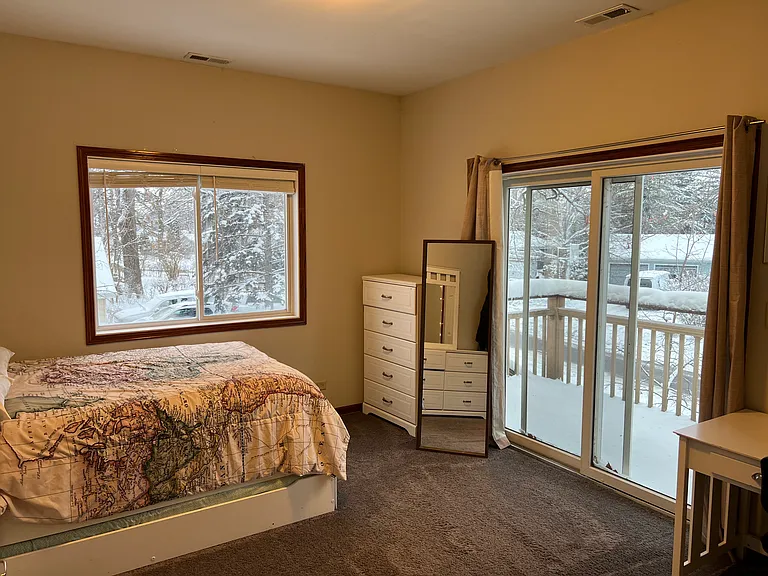 Room # 5 with walk-in closet and sliders to private balcony $1000 per month