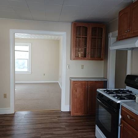 Kitchen looking into living room.