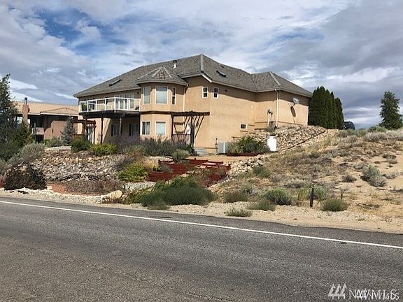 Territorial, Desert Canyon and Mountain Views.  Large manicured parcel