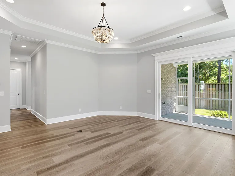 Great room opens onto screened-in porch