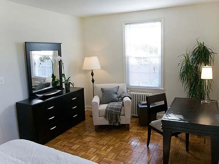 Bedroom with hard surface flooring