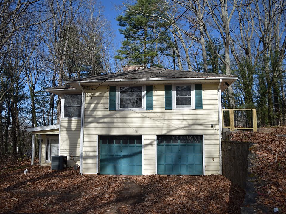 Large 1/2-acre property surrounded by heavily wooded mature trees provide a beautiful environment in desirable neighborhood.