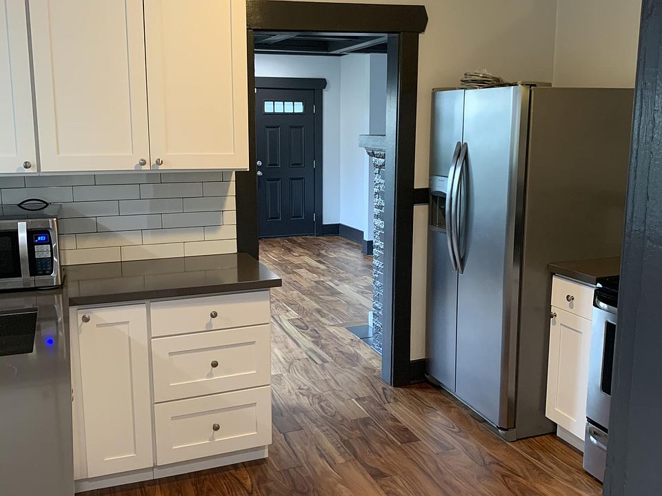 Kitchen with new cabinets, sink and countertop
