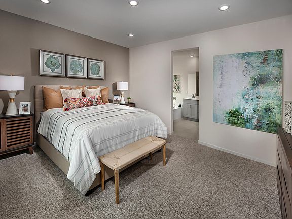 Residence 2 primary suite modeled at a nearby Meritage community.