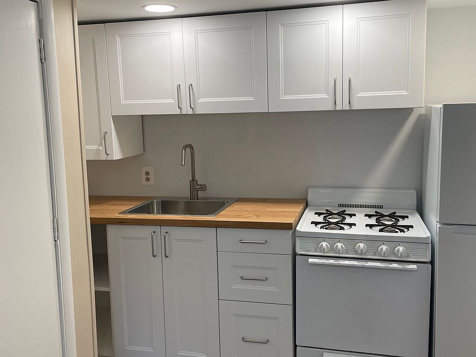 Kitchen with new cabinetry and solid top