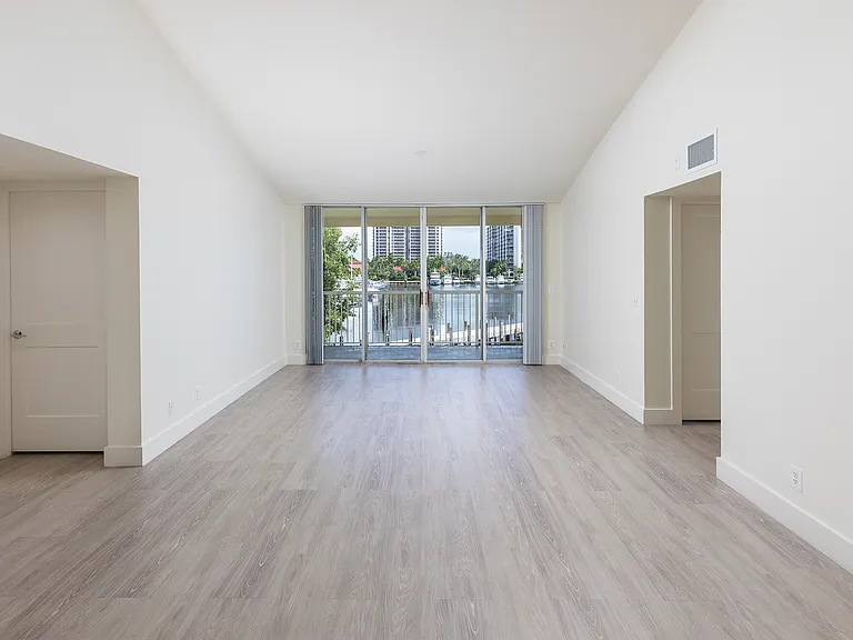 Spacious living room with wood flooring throughout