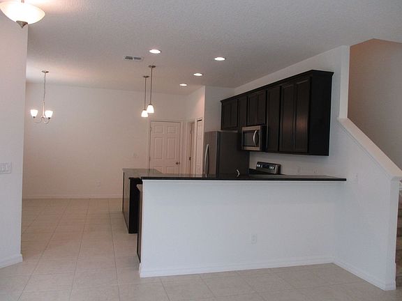 3rd image of 6971 Tussilago Way