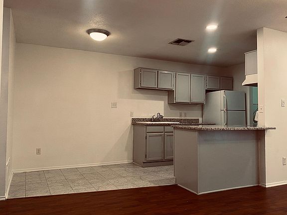 Alt. View From Living Area, Open to Kitchen Bar & Dining Area/ Breakfast Nook.