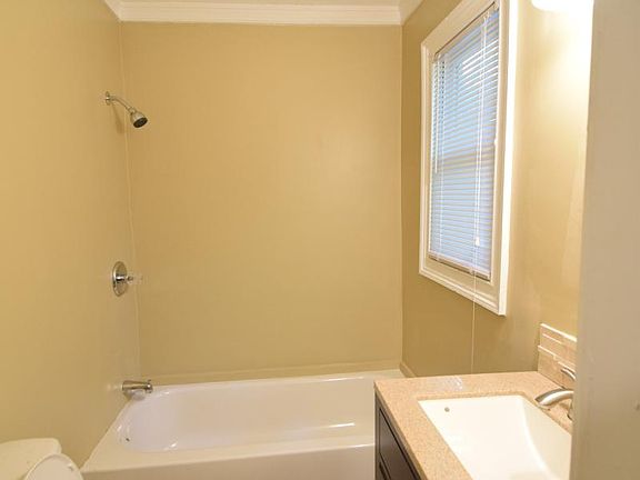 Master Bath (currently placing tile around tub)