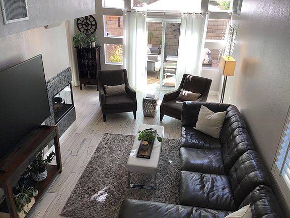 Living room with dual sided fireplace