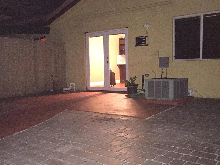 Private, paved, fenced backyard
