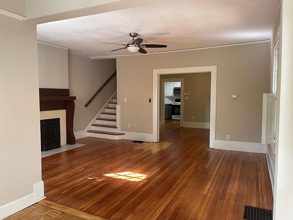 living room, looking through dining room to the kitchen