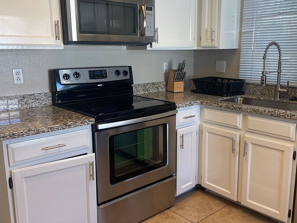 Kitchen with stainless steel appliances and granite countertops