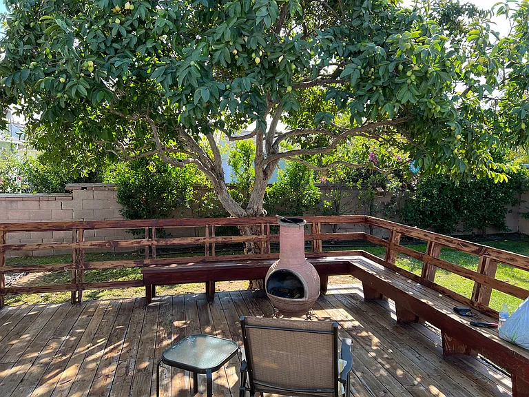 Another view of the back yard from the deck.