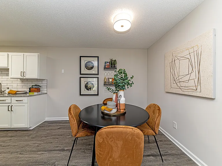 Dining area with hardwood-style flooring