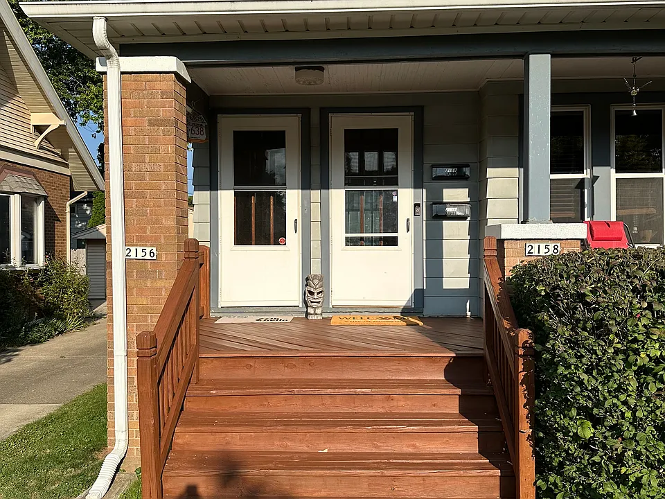 Each tenant has their own front entrance to the house. This unit's entrance is on the left hand side.