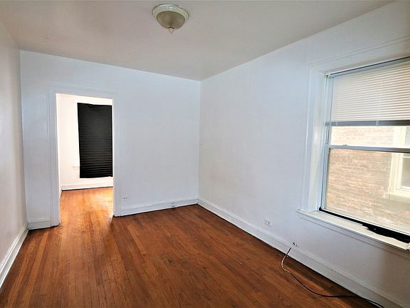 5th image of 10642 S Avenue C #1REAR