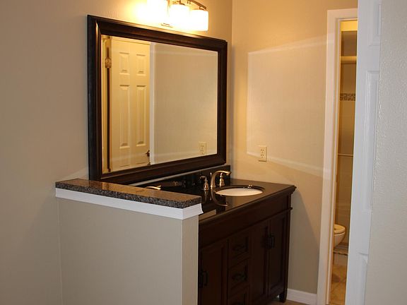Master ensuite bath, double sink with granite countertop